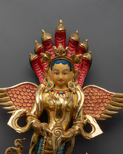 Close-up of Naga Kanya’s serene face and detailed serpent design