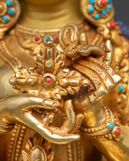 Namgyalma Ushnishavijaya statue detailed side close up Vishwa vajra highlighting gold-gilded details
