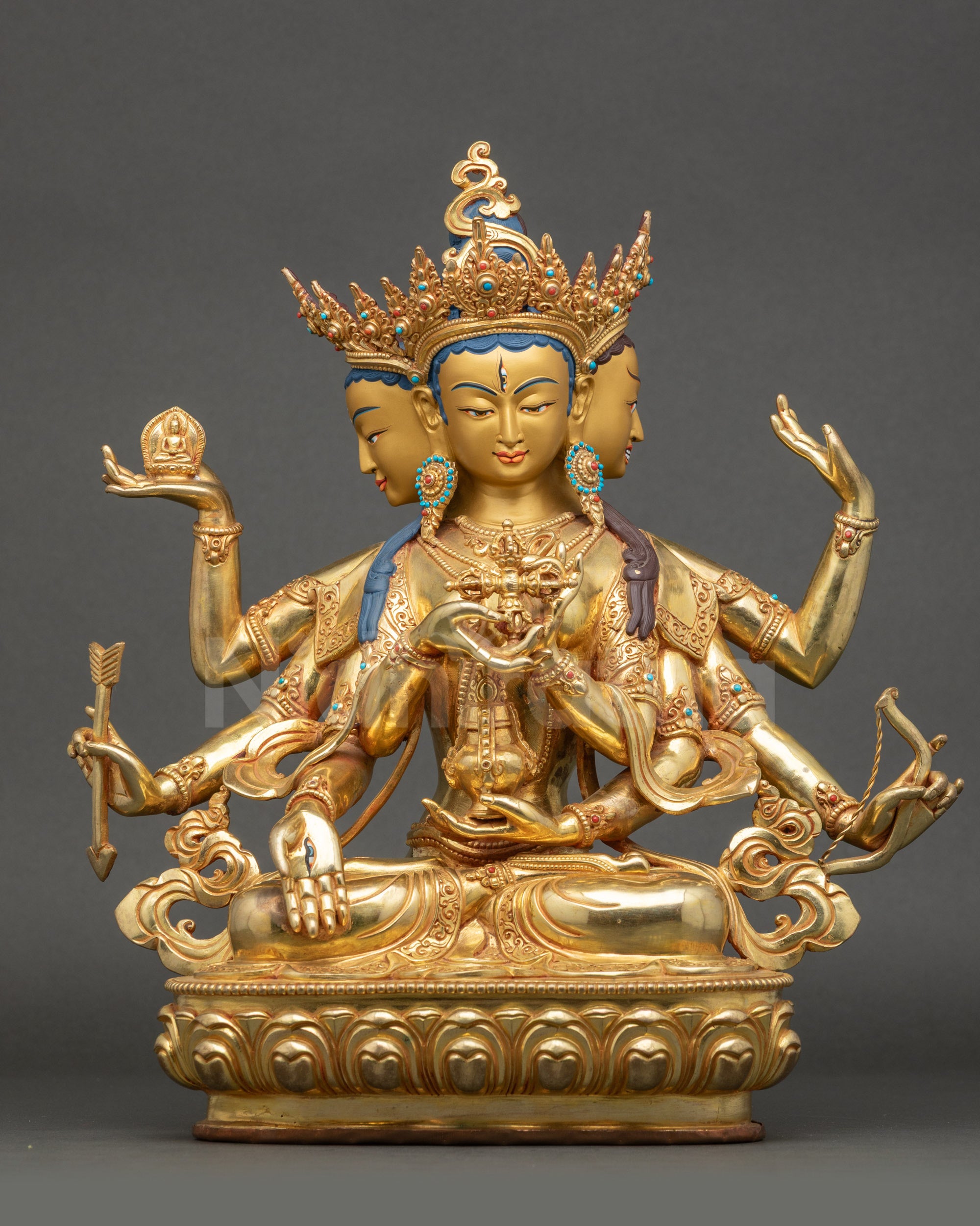 Namgyalma statue with three faces eight arms, gold fire-gilded copper Himalayan sculpture