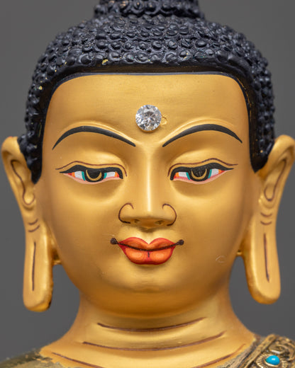 Near view of Shakyamuni Buddha face showing calm expression and intricate carvings