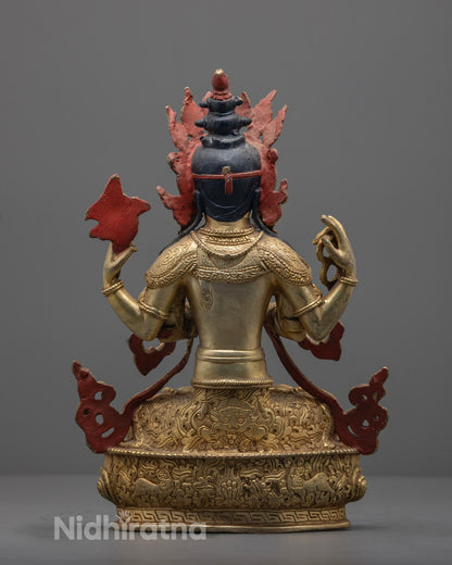 Nepal artisan handcrafting Chenrezig Statue with fire-gilding.
