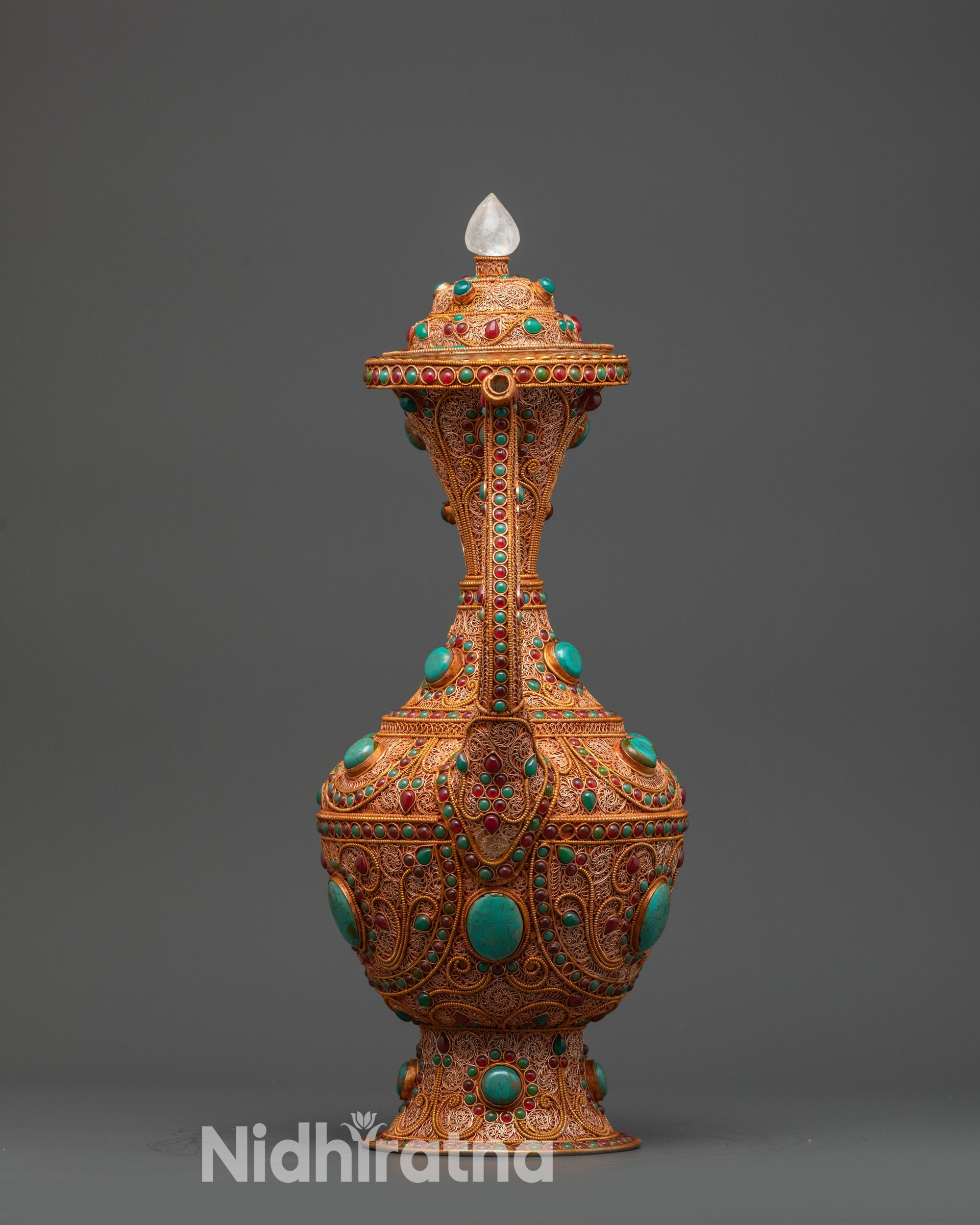 Nepalese Copper Karuwa featuring curved body, slender neck, and ornate gemstone details