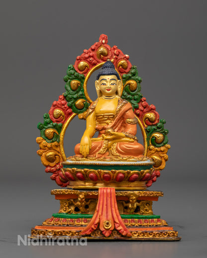 Nepalese Divine Buddha Shakyamuni Sculpture with gold-plated face and copper body adorned with vibrant acrylic colors and multicolored halo