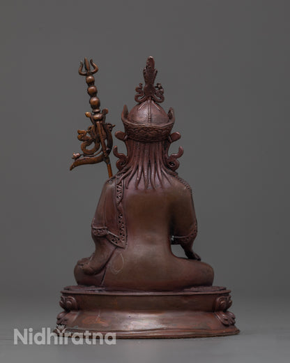 Nepalese Tsokye Dorje Statue seated on lotus throne holding vajra and kapala, tantric master for meditation and spiritual devotion