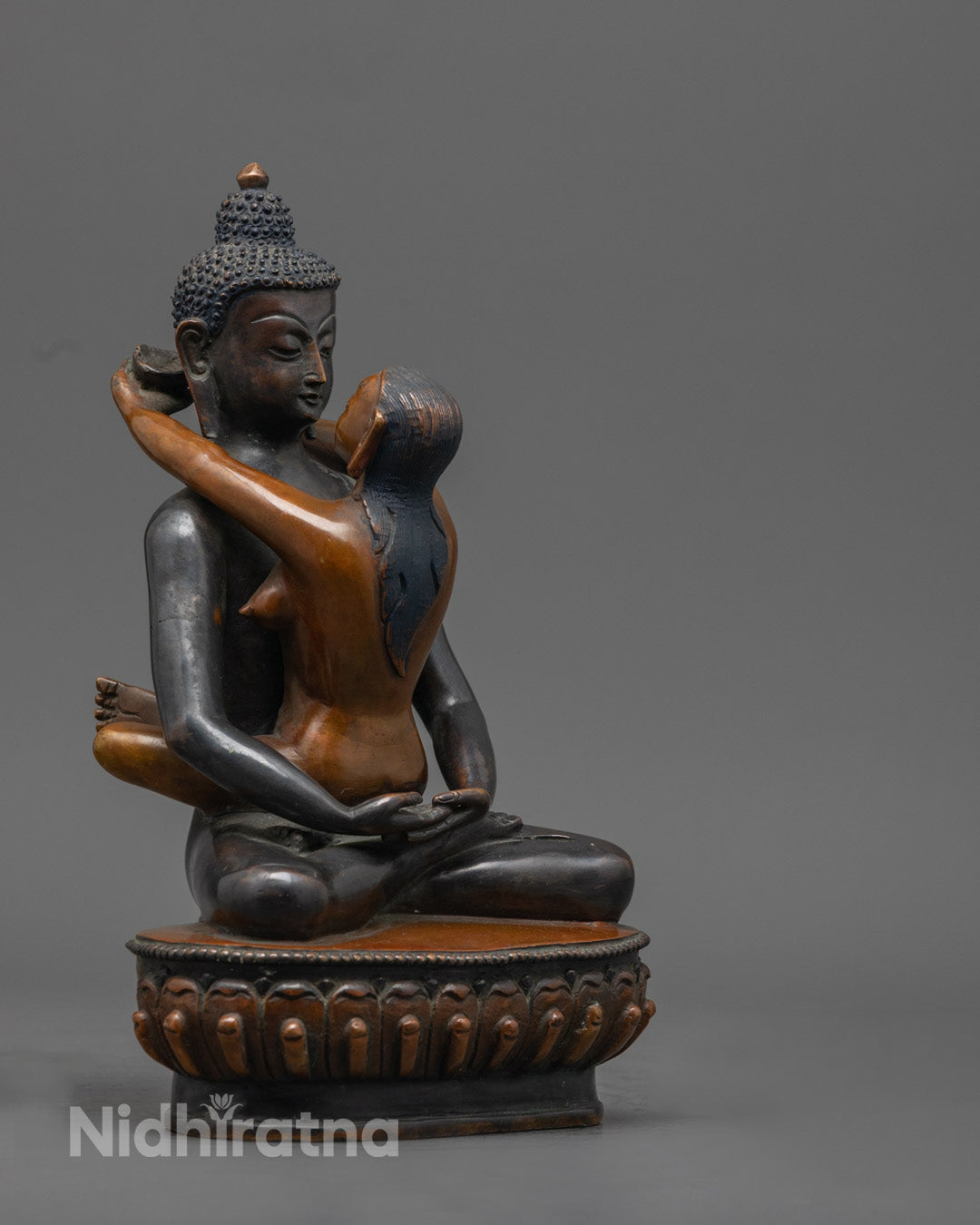 Oxidized Samantabhadra statue symbolizing wisdom and compassionate action in Buddhist art