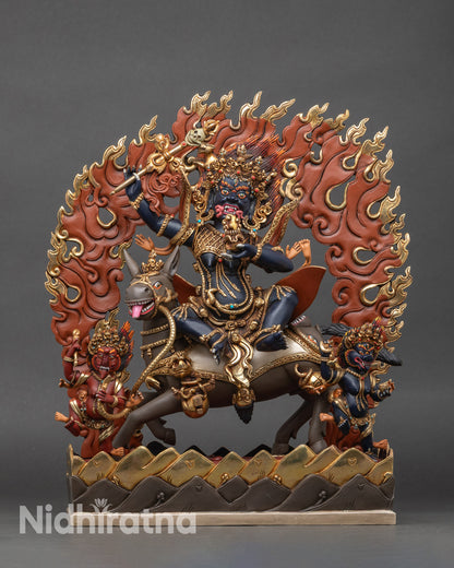 Palden Lhamo statue front view, wrathful Dharmapala with gold-gilded robes and vibrant details.