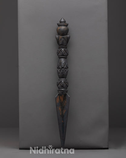 Phurba dagger placed on altar for meditation and spiritual transformation