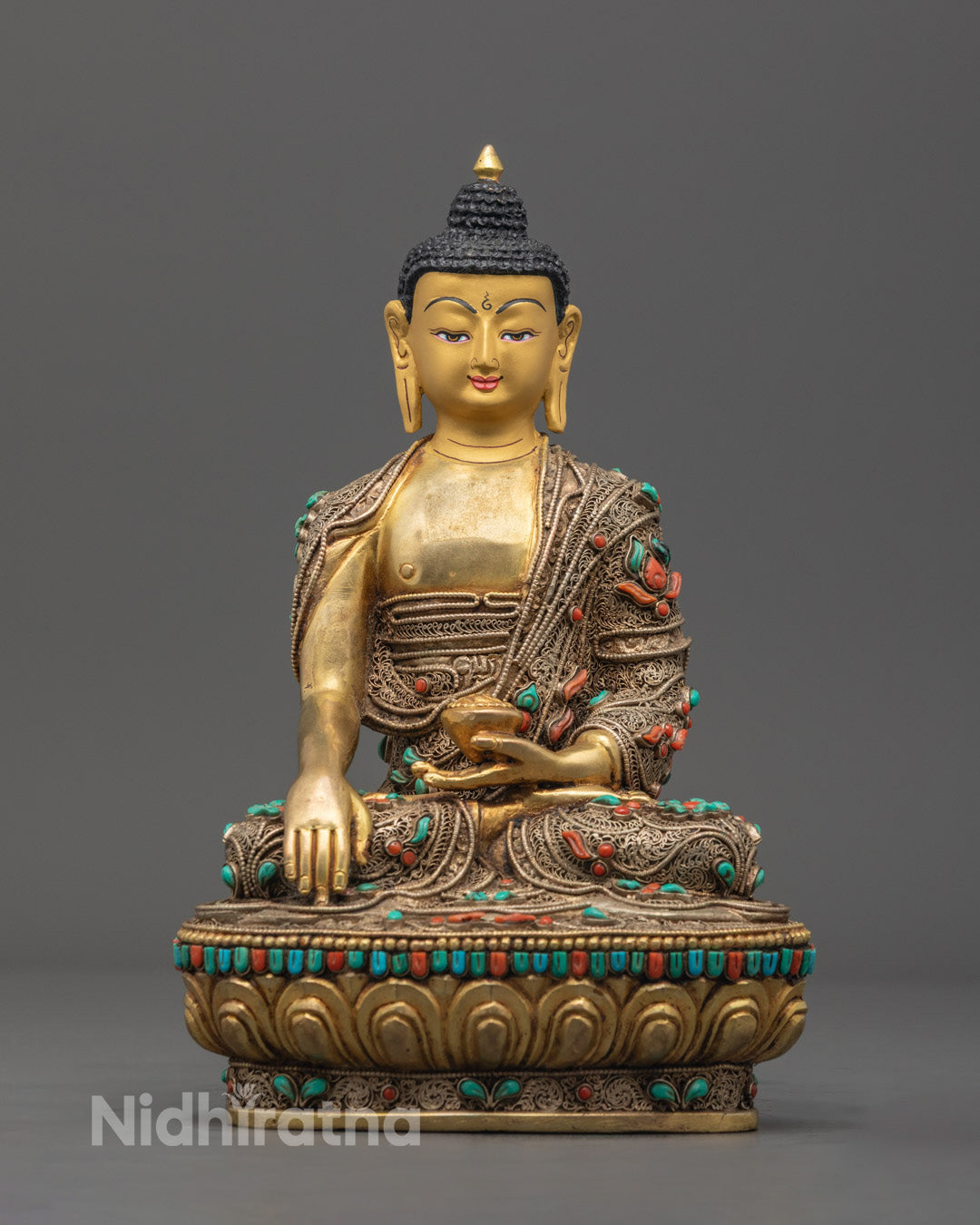 Premium Shakyamuni Buddha Sculpture with gold-gilded face and gold-fire gilding, handcrafted by Nepalese artisans.