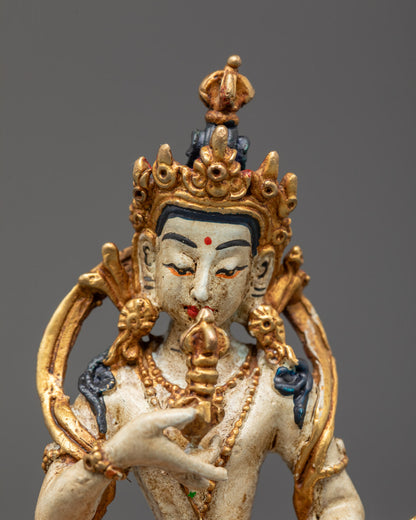 Premium electroplated Vajrasattva Buddha holding vajra and bell with vibrant orange lower garment and detailed carving