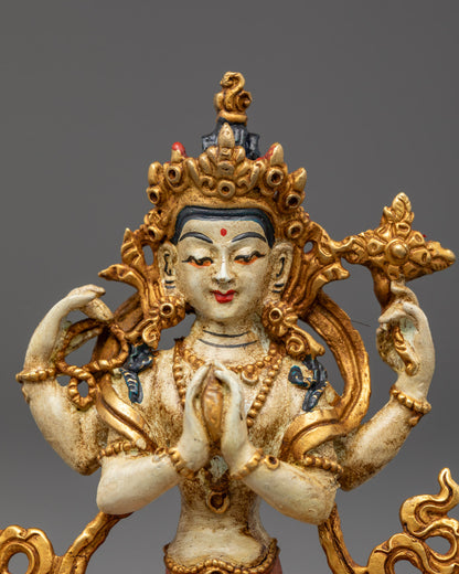 Premium machine-made Avalokitesvara statue with acrylic-painted details, vibrant orange lower garment, and wish-fulfilling gem in both hands.