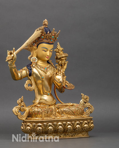 Prince Manjushri with gold-painted face, intricate carved robes, semi-precious stone inlays, Nepal handmade