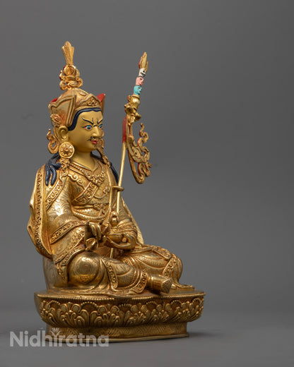 Profile of Guru Rinpoche statue on blossoming lotus throne with intricate halo design