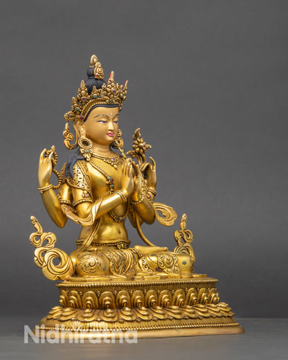 Profile view of Four-Armed Chenrezig statue, copper and 24K gold Buddhist sculpture