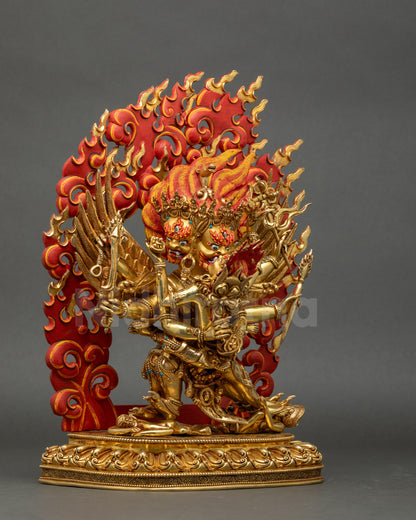 Right side view of six-armed Hayagriva statue standing on lotus, adorned with crown, jewelry, and sacred objects.