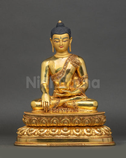 Radiant Shakyamuni Buddha Statue front view handcrafted Nepalese copper gold art