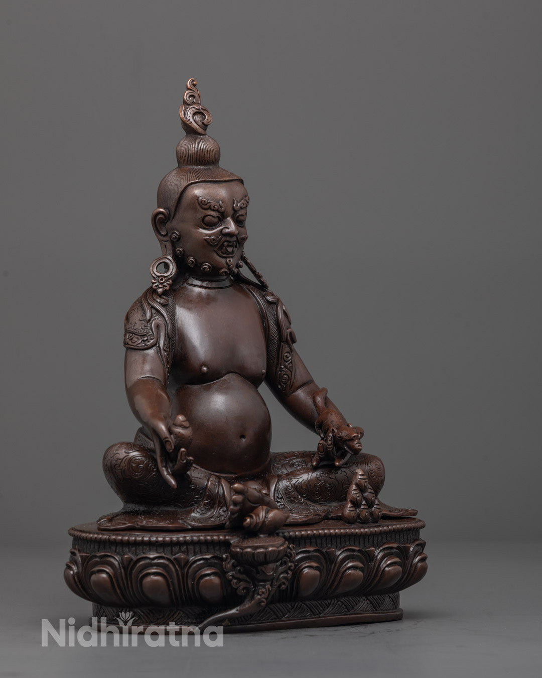 Rear view highlighting intricate jewelry and traditional lost wax craftsmanship on statue