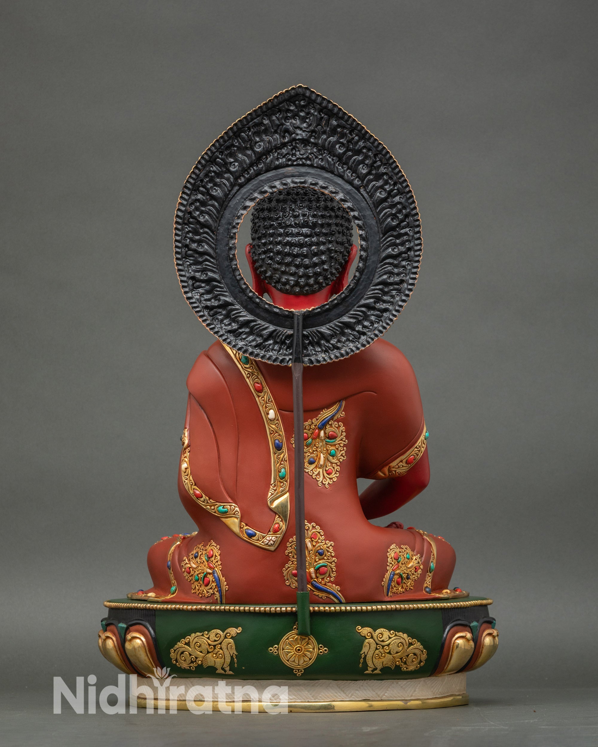 Rear view of Amitabha Buddha statue, showing detailed halo and gold fire-gilded copper finish