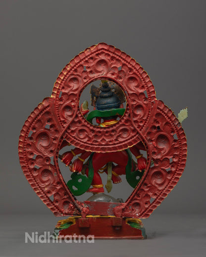Ganesh sculpture displaying the sacred hollow chamber for mantras and relics, finished in detailed copper work.