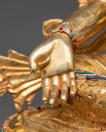Rear view of Green Tara Statue highlighting the flowing robes, ornate lotus base