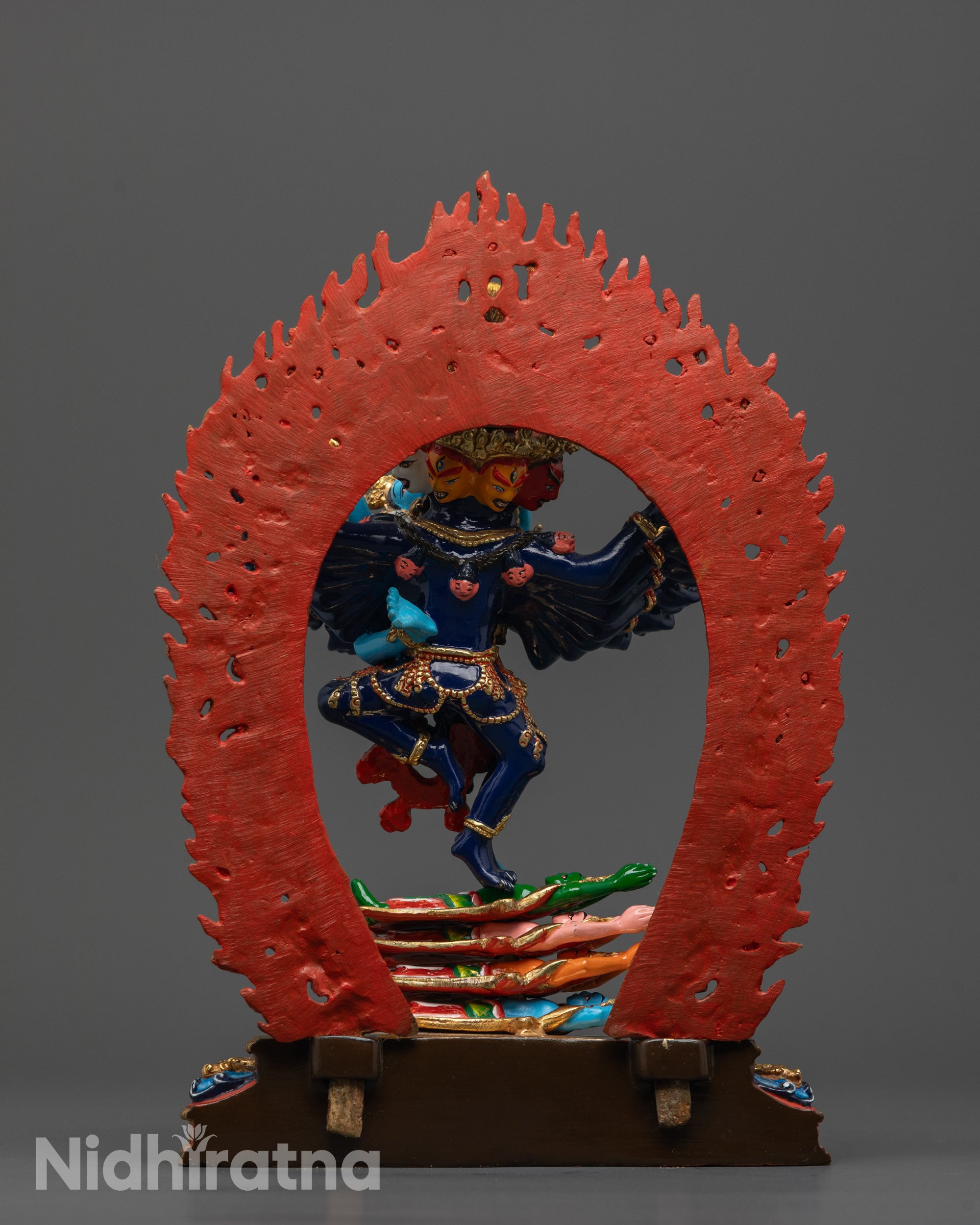 Rear view of Hevajra Statue highlighting the flaming halo, hand-painted copper surface