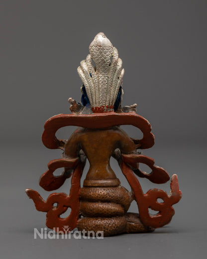 Nagakanya Statue revealing the hollow chamber for sacred mantra placement, highlighting traditional craftsmanship and spiritual functionality.