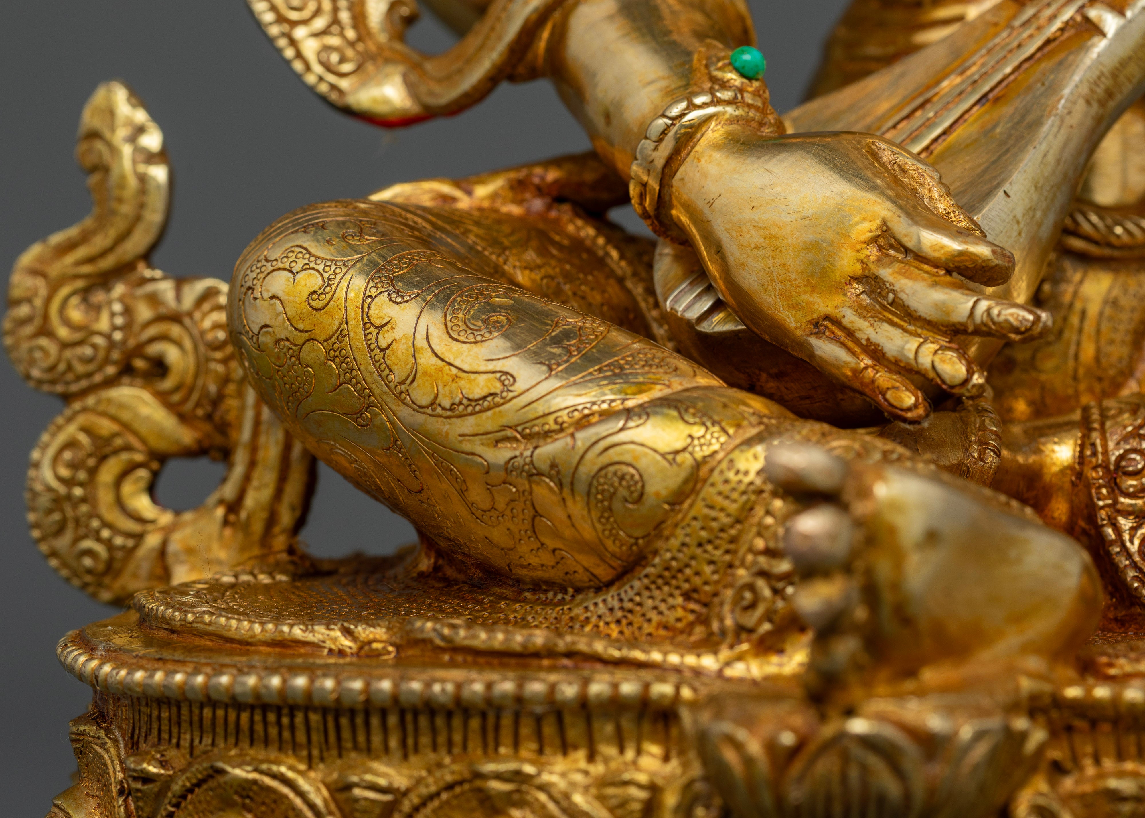 Rear view of Nepalese Saraswati statue, detailed craftsmanship and gold fire-gilding
