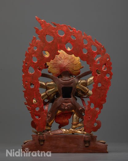 Rear view of Six-Armed Mahakala statue highlighting detailed gold gilding