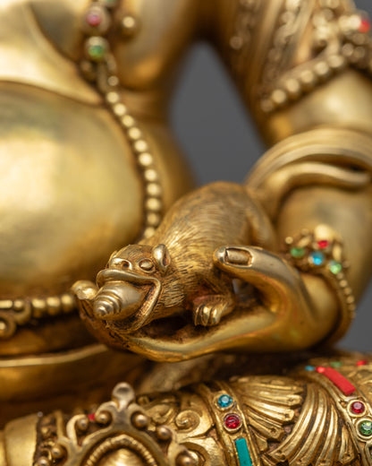 Rear view of detailed Dzambhala statue showcasing intricate craftsmanship and fire gold gilding