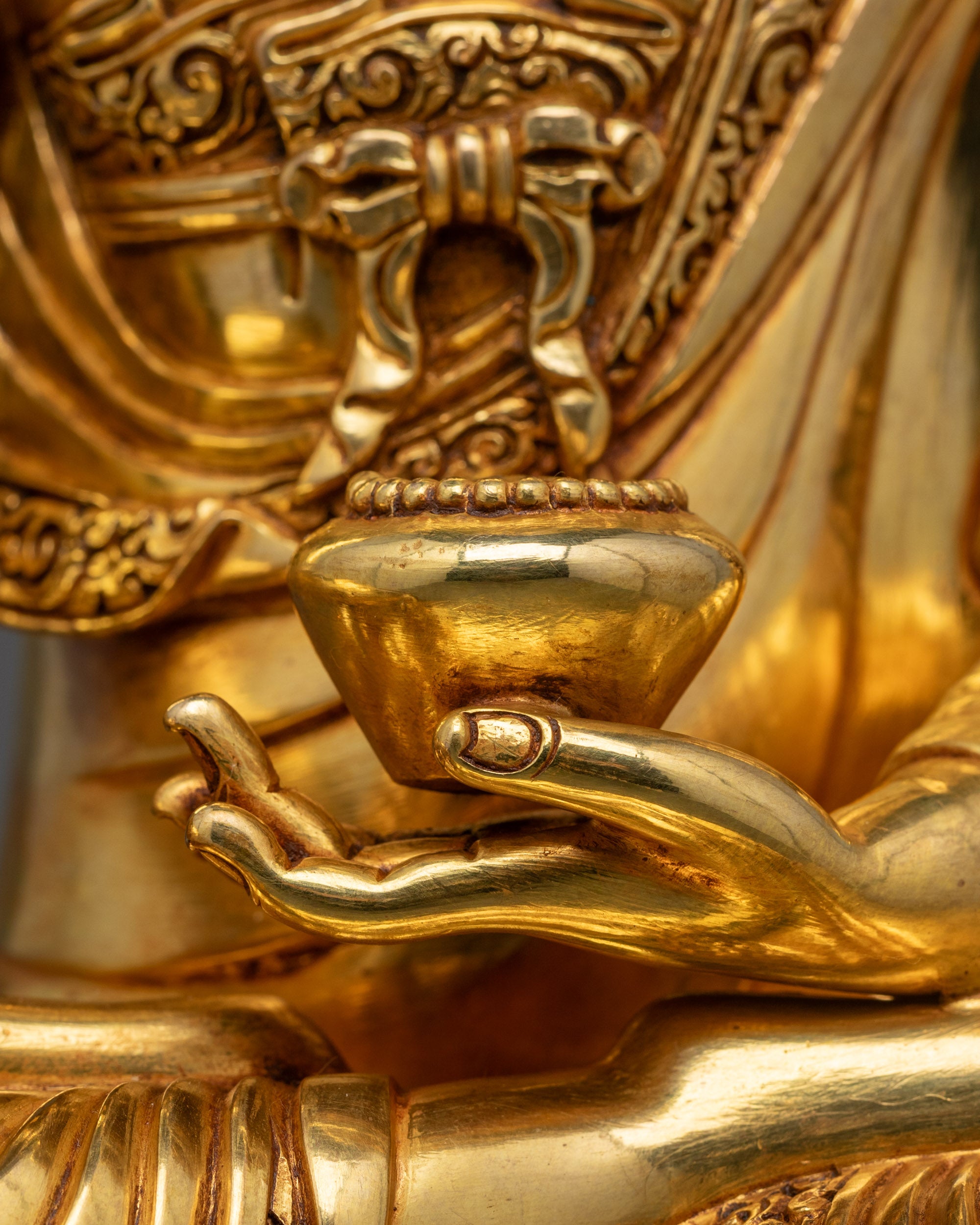 Rear view of hand-carved Shakyamuni Buddha Statue with smooth gold finish