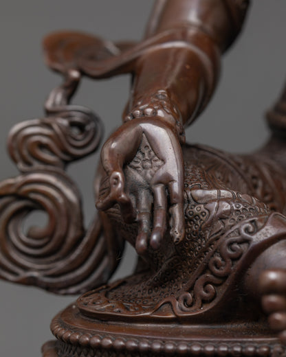Rear view of machine-crafted Green Tara Statue highlighting intricate carving