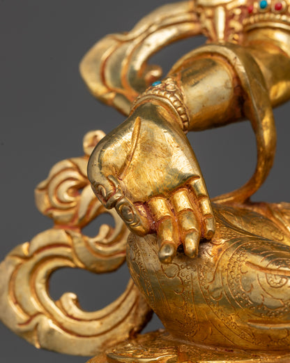 Rear view of the Green Tara Statue revealing intricate lotus base carvings