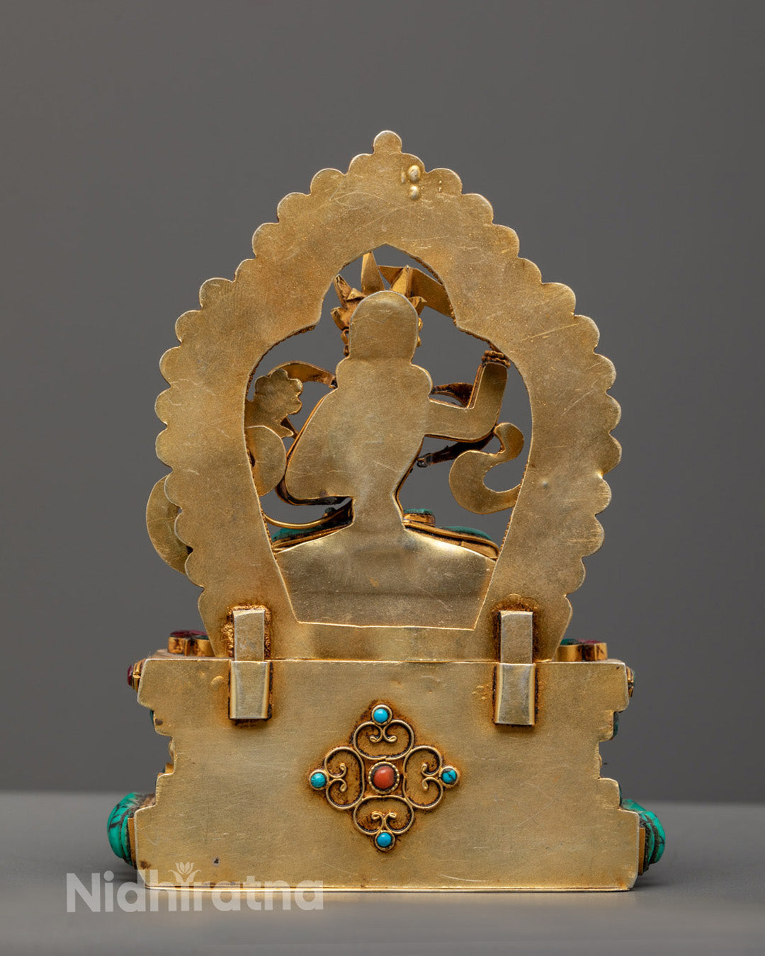 Manjushri statue displaying the hollow consecration chamber and fine sculptural details.