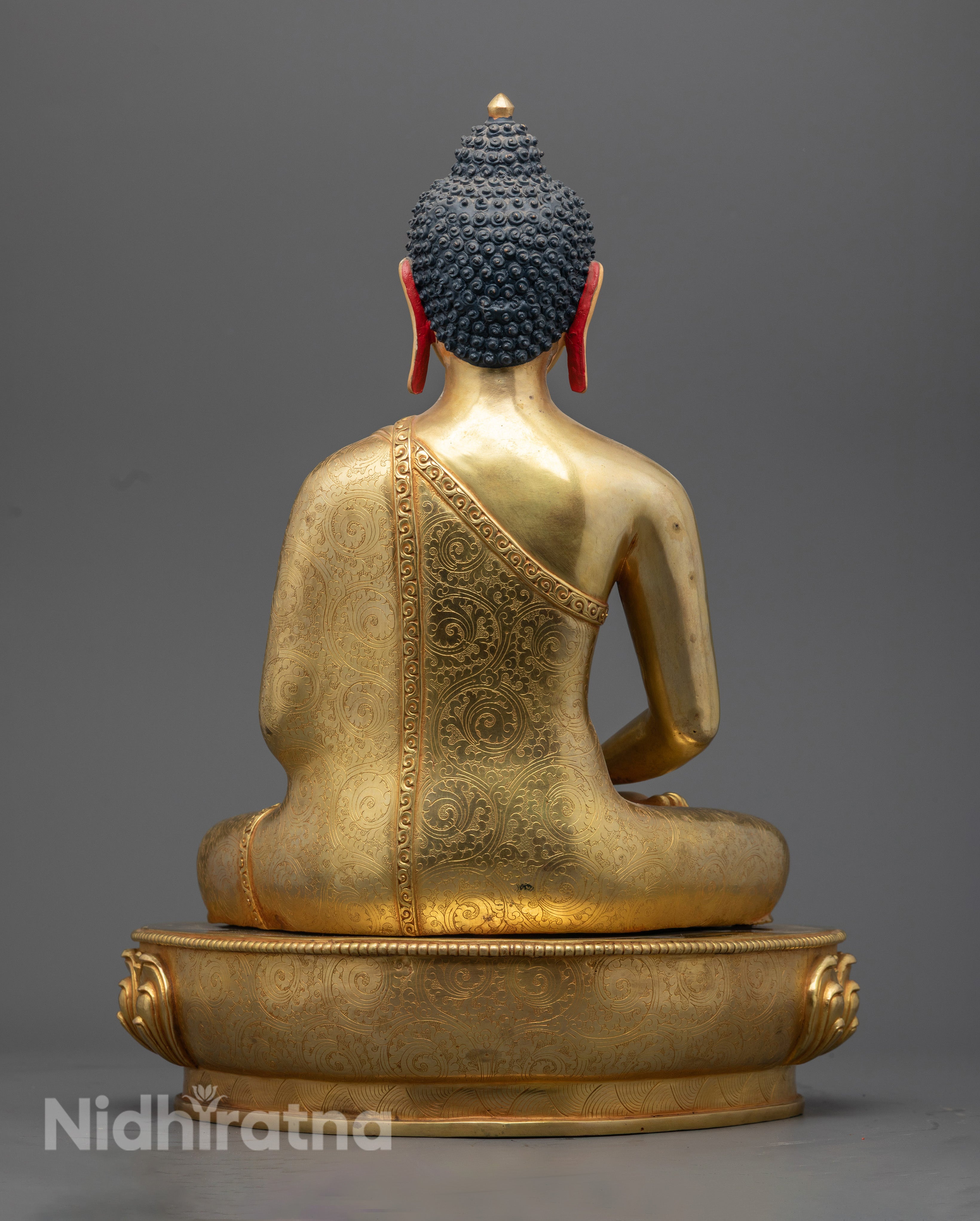 Shakyamuni Buddha Statue revealing the hidden hollow space for placing auspicious mantras and sacred substances.