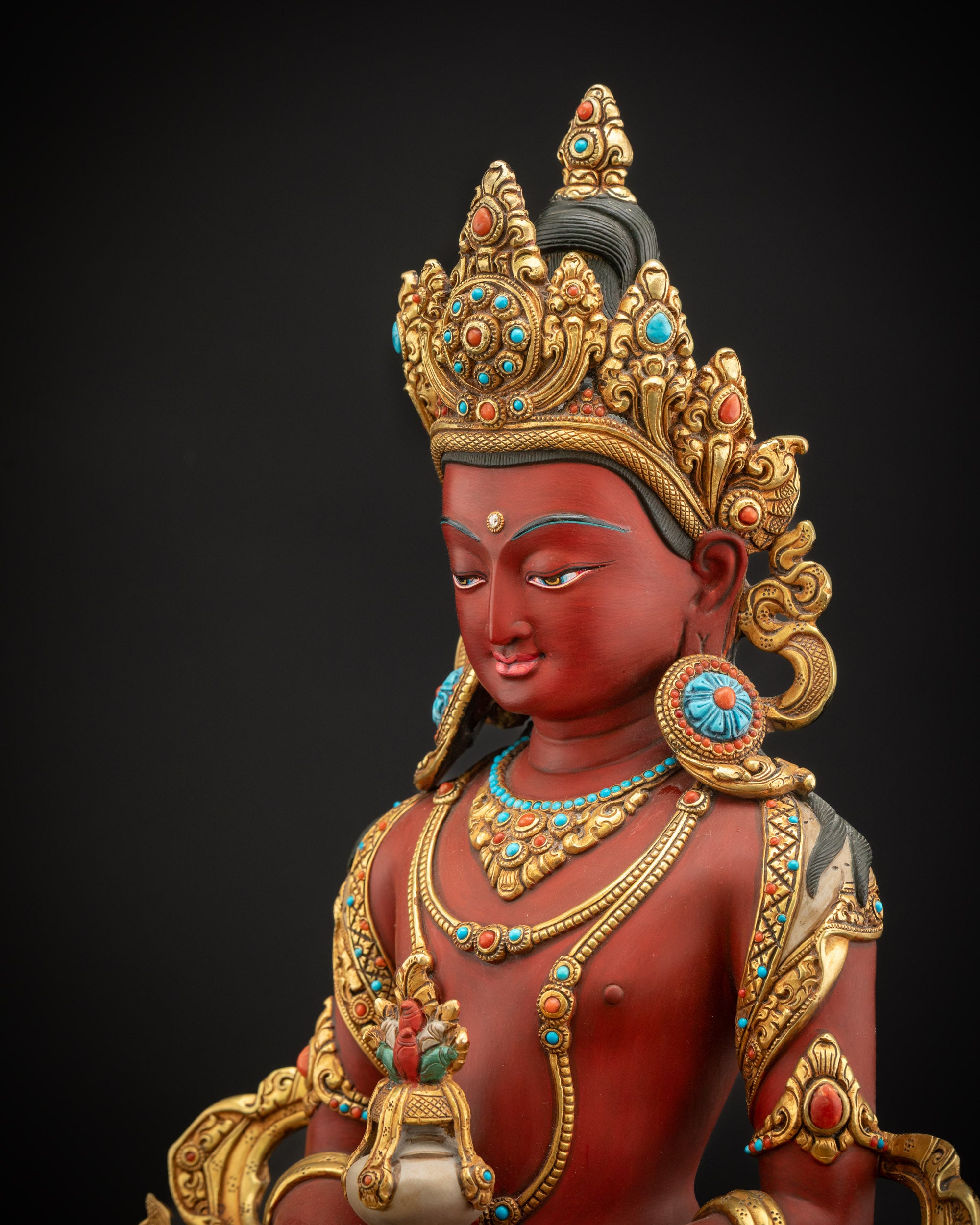 Red Amitayus Masterpiece Statue side close-up showing hand-painted details and ornaments