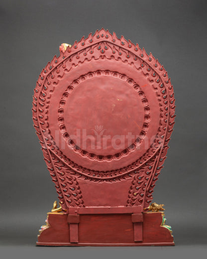 Red Vajrayogini Statue back view showing intricate patterns flames and skull halo