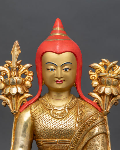 Regular close-up of Longchenpa statue showing intricate copper and gold details