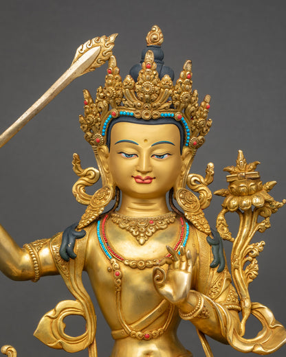 Regular close-up of Bodhisattva Manjushri statue showing intricate robes and jewels