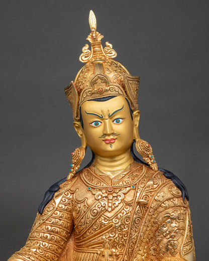 Regular close-up of Guru Rinpoche Statue showing intricate gold fire-gilded details