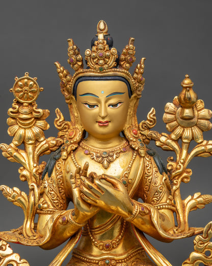 Regular close-up of Maitreya Buddha sculpture showing intricate gold layers and carvings