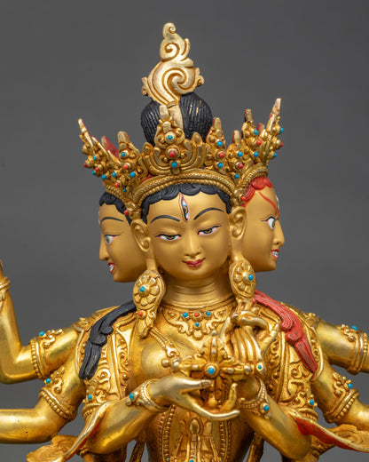 Regular close-up of Namgyalma Statue showing detailed gold-painted faces and sacred arms