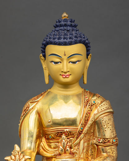 Regular close-up of Nepalese Medicine Buddha sculpture with floral halo details