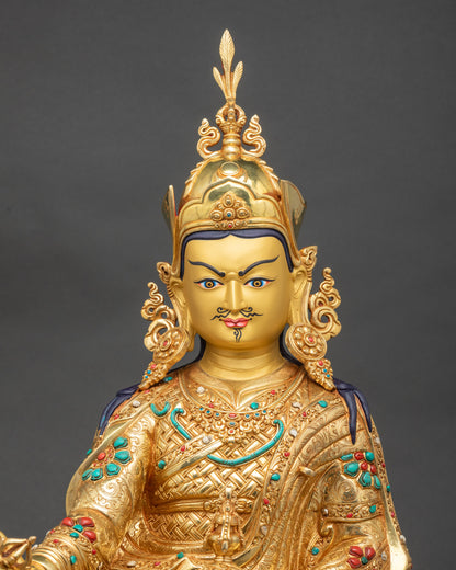 Regular close-up of Padmasambhava sculpture showing intricate lotus pedestal and royal ease posture