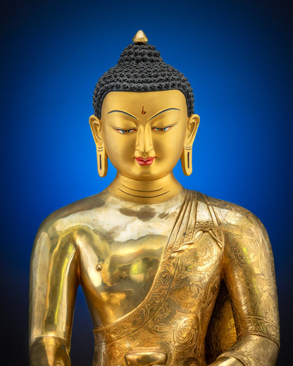 Regular close up Buddha Shakyamuni gold gilded face and floral motif robe sculpture