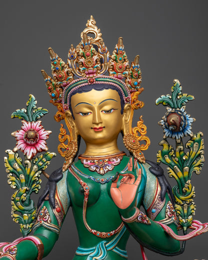 Regular close up Green Tara goddess statue detailed hand-painted floral motifs
