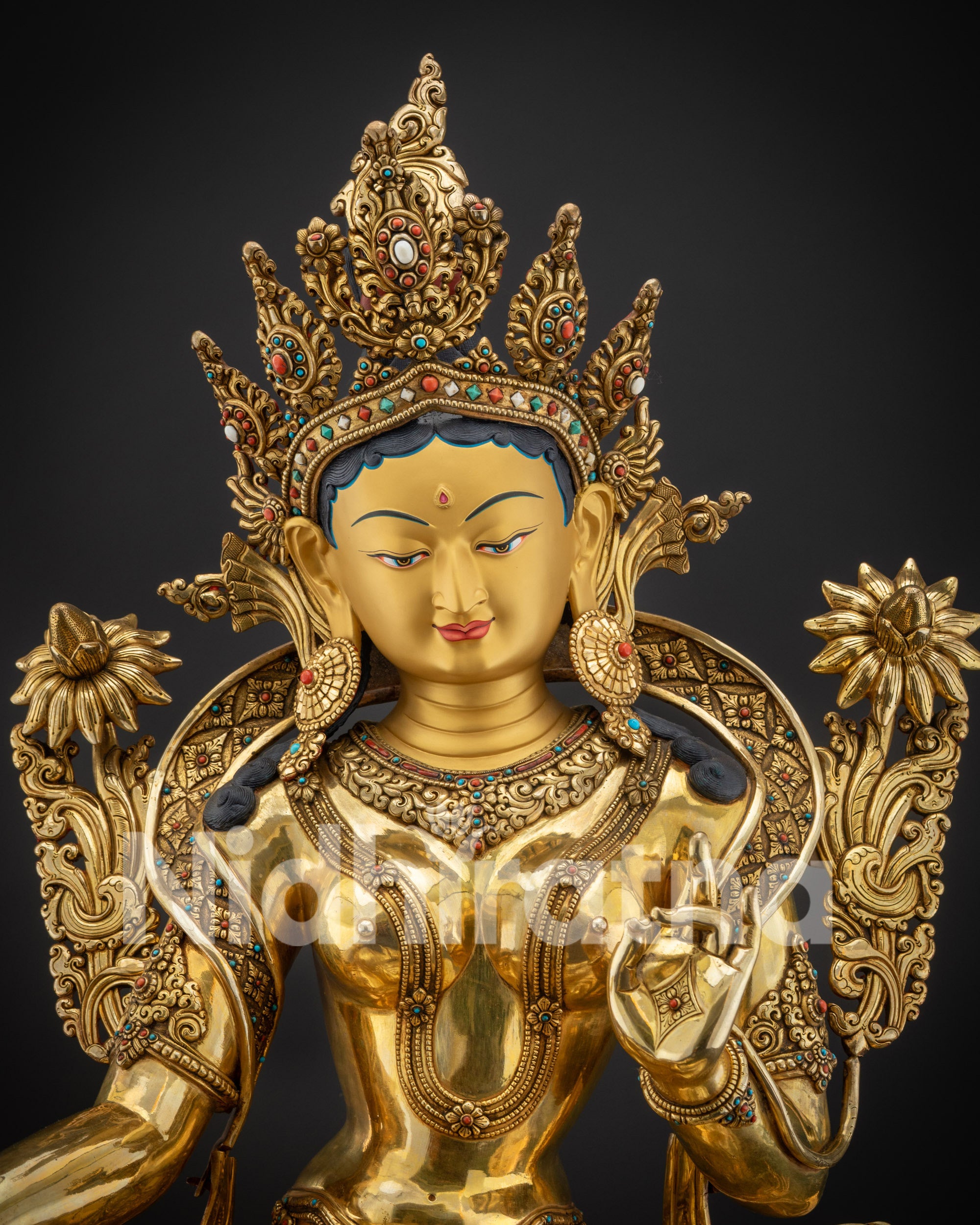 Regular close up Green Tara meditation statue golden face with ornate lotus seat
