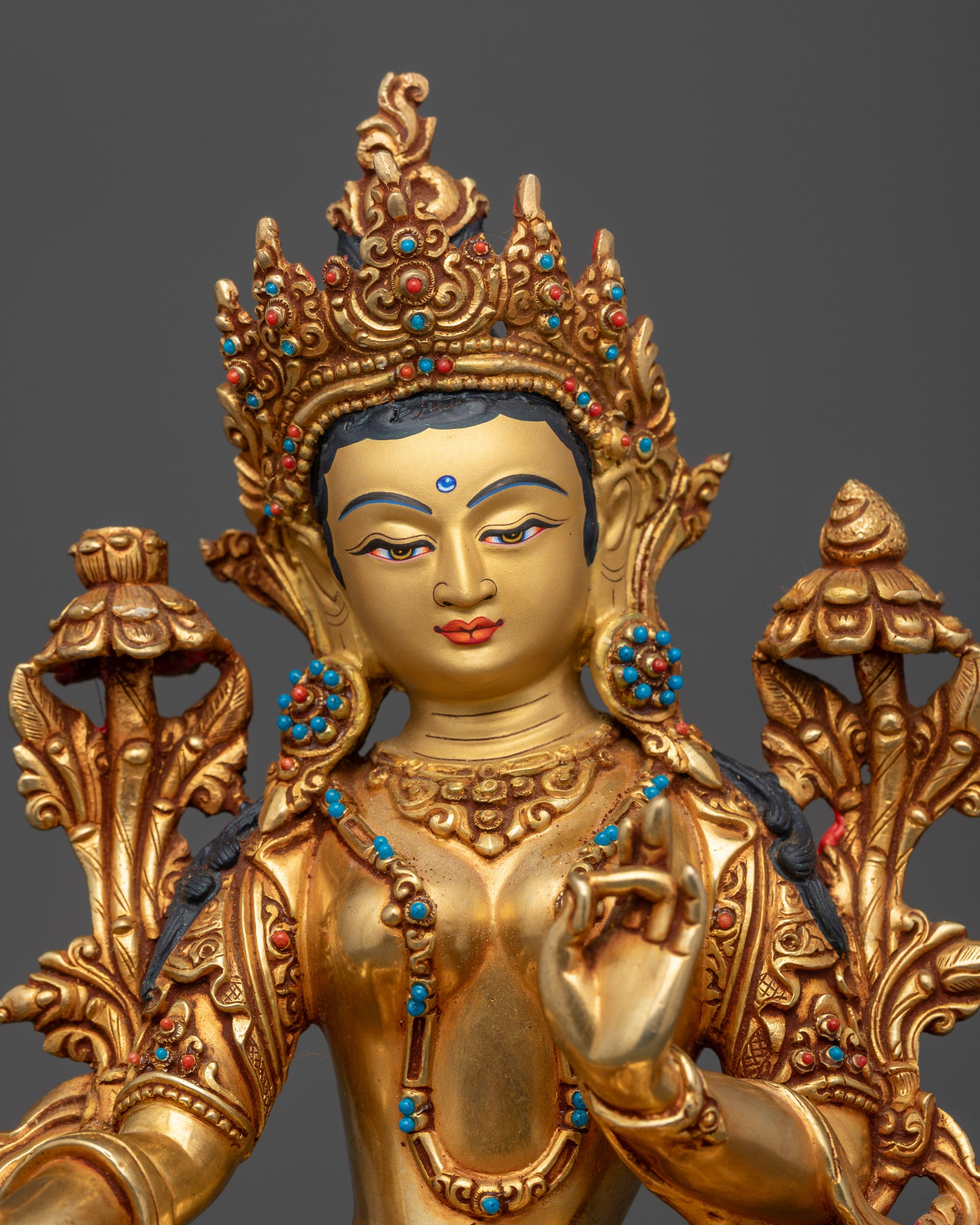 Regular close up Green Tara statue showing five jeweled crown and flowing robe details