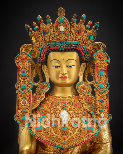 Regular close up Jowo Rinpoche Buddhist deity statue with gold gilded sacred ornamentation
