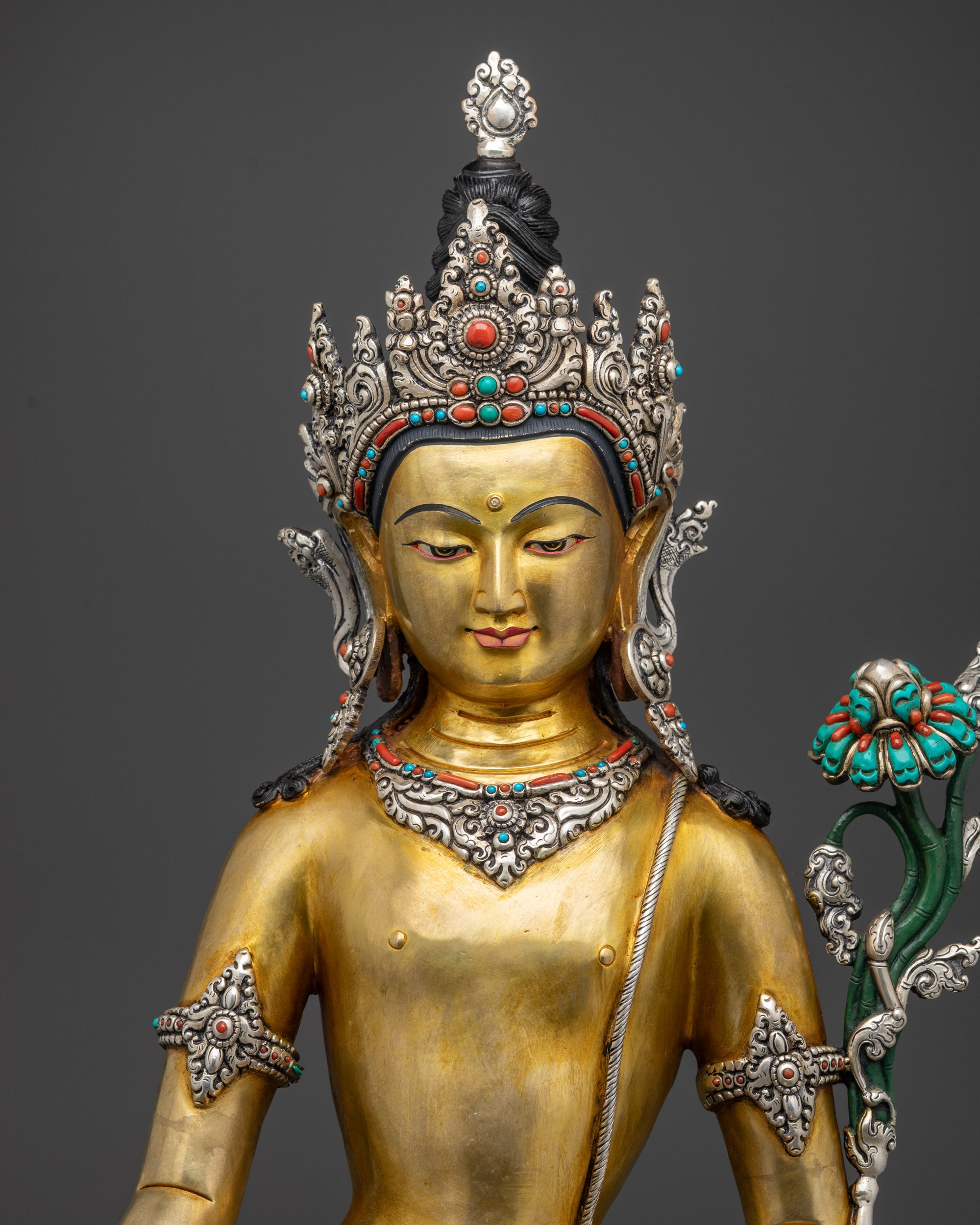 Regular close up Lokeshwor statue showing serene face and Utpala stem
