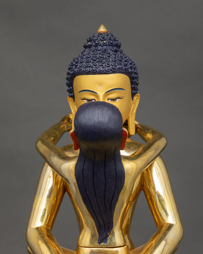 Regular close up Samantabhadra Yab Yum Adibuddha sculpture showing gold-gilded face details