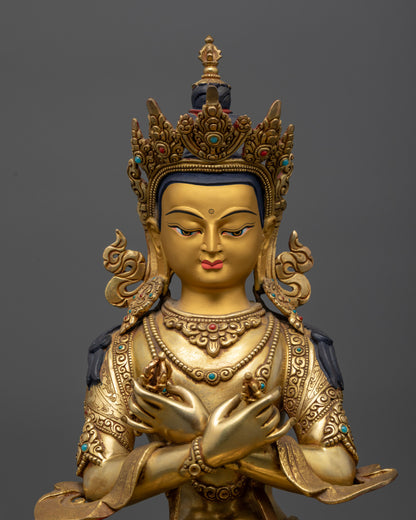 Regular close up Vajradhara Buddha statue showing calm expression and floating robe
